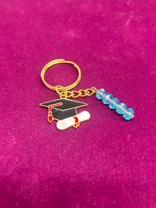KEYRING GOLD GRADUATE WITH BLUE CRYSTAL