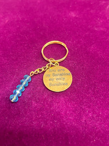 KEYRING GOLD WITH BLUE CRYSTAL 1PC