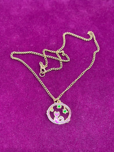 PURPLE CAT WITH GREEN STARS NECKLACE